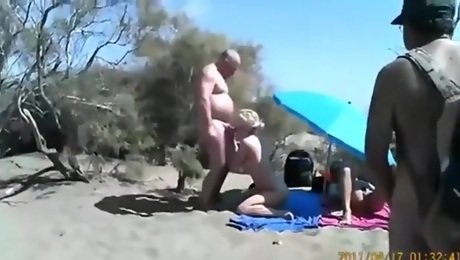 Cuckold threesome at a nude beach. spectators ? they don't give a